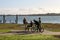 Teenaged girls at a picnic table out by the water on a late Saturday afternoon in the Redlands Queensland Australia May 23 2015