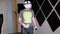 Teenager in 3D Glasses with Game Controllers Plays in a Soundproof Room