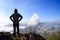 Teenager asian boy standing at mountain