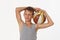 Teenager with a basketball on a white background.