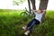 Teenager on a bicycle traveling in the woods