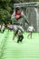 Teenager bouncing on an inflatable Stonehenge