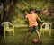 Teenager boy with ball close up photo playing football