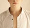 Teenager boy in cotton white unbuttoned shirt