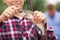 Teenager boy holding catch fish on hook