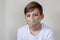 Teenager boy in surgical mask
