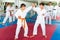 Teenager boys practicing new karate moves