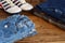 Teenager casual outfit. Boys shoes, clothing and accessories on wooden background - sweater, shirt, trousers, jeans, sneakers. Top