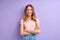 Teenager caucasian girl isolated on purple background keeping arms crossed in frontal position