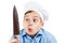 Teenager chef really surprised failure with a knife. Isolated studio