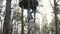 A teenager climbs the stairs to an old water tower in an abandoned territory