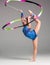 Teenager doing gymnastics dance with ribbon