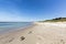 Teenager at an empty beach in summer