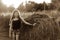 Teenager farmer girl with haystack close up photo