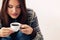 Teenager girl attractive enjoying coffee