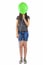 Teenager girl with balloon cover her face