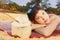 Teenager girl with coconut and straw