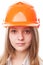 Teenager girl in a hardhat