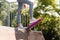 Teenager girl with penny board ready to go down on skateboard park playground. Sport equipment. Extreme lifestyle.