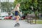 Teenager girl quickly roller skates in skate park. Active lifestyle, hobby and childhood concept