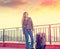 Teenager girl standing outdoor at roof terrace