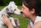 Teenager girl with white dalmatin puppy