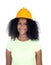 Teenager girl with yellow construction helmet