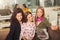 Teenager girls hanging out together in a coffee shop