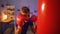 Teenager in gloves punching boxing bag, dreaming to become boxer, fitness