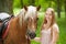 Teenager with haflinger horse