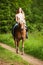 Teenager with haflinger horse