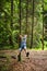 Teenager hanging a pine tree