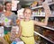 teenager with her mom shows selected foods