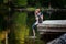 Teenager on a lakeside dock