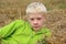 Teenager lying in the straw