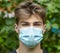 Teenager in the mask in a pandemic coronavirus