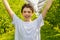 Teenager next to apple trees