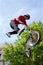 Teenager Performs Midair Stunt In Pro BMX Bike Competition