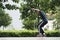 A teenager practices with his skateboard