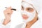 Teenager problem skin care - woman facial mask