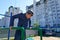 Teenager push up on the uneven bars, doing a workout outdoor