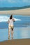 Teenager running on beach