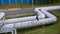 Teenager runs through the pipes of the heating main.