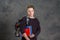 Teenager with satchel and books