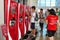 Teenager selecting drink from touch screen of modern vending machine for drinks