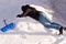 A teenager shoveling snow in his yard. The concept of a snowy winter