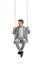 Teenager sitting on a swing and looking to the left