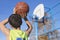 Teenager throwing a basketball into the hoop