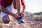 Teenager touching his shoes - runner lifestyle and sportive concept - positive vibes