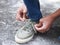 Teenager tying shoelaces